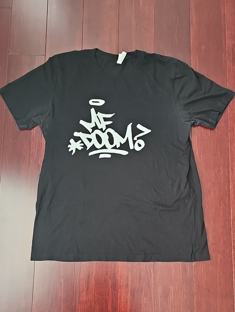 Black Graphic Tee with White Street-Style Logo